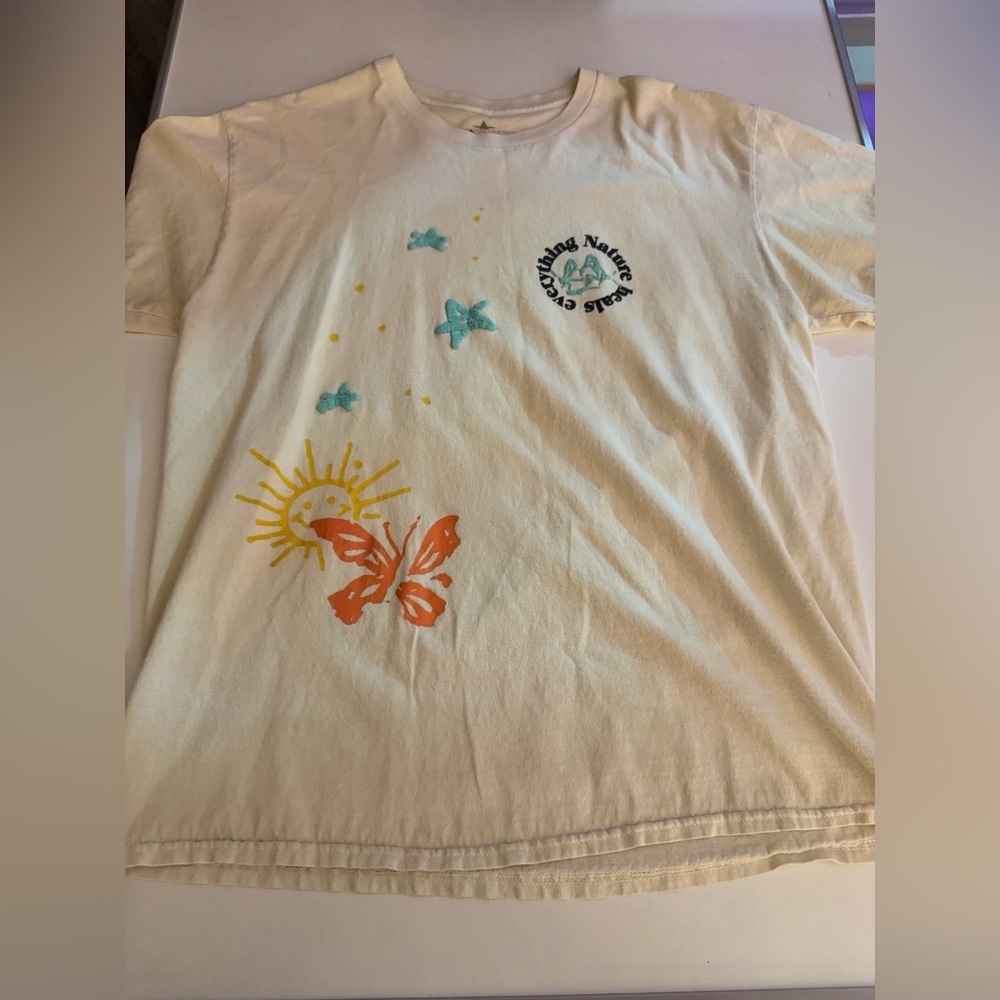 Cream Graphic T-Shirt with Butterfly and Sun Design